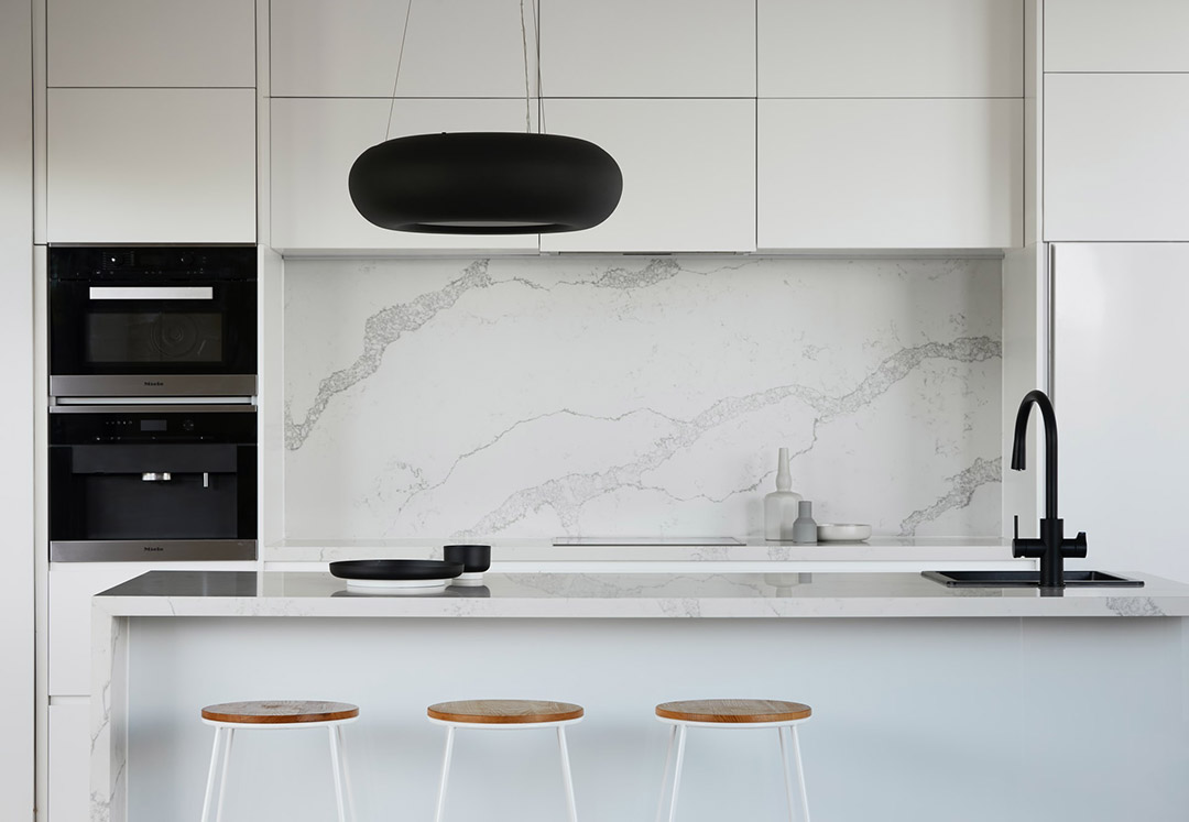 Elouise Avenue - White kitchen with marble countertops