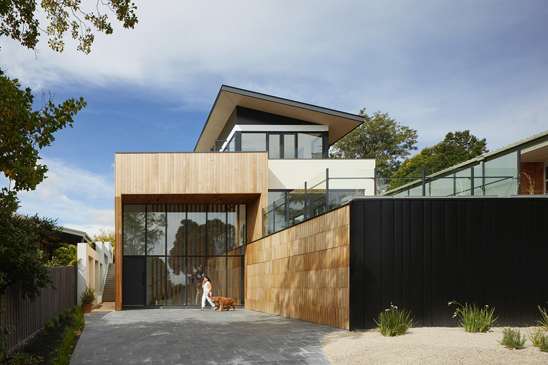 Grant Residence - Exterior view of a home - lots of windows, boxy design.